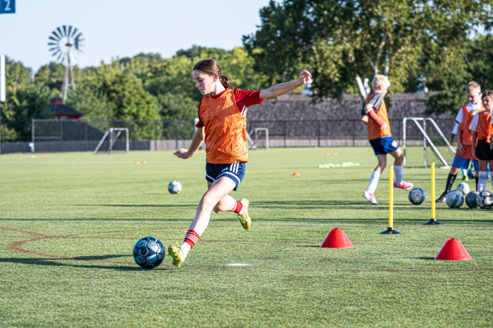 A player dribbling at a Player Development Program night